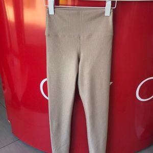 BeachRiot full length legging with a ribbed texture and gold fabric